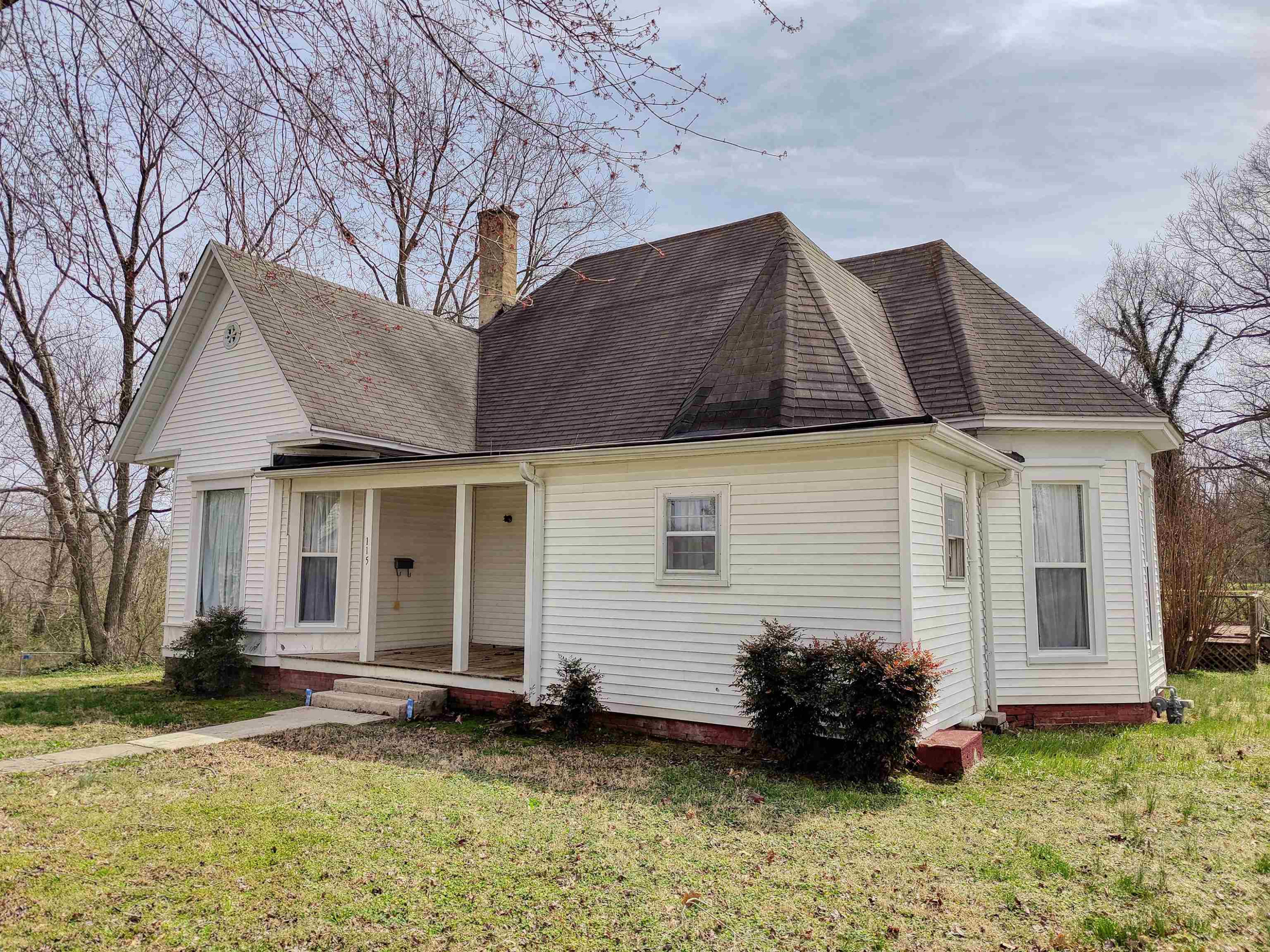 115 Walnut Lane McKenzie, TN 38201 - Photo 2 of 16 a backyard of a house