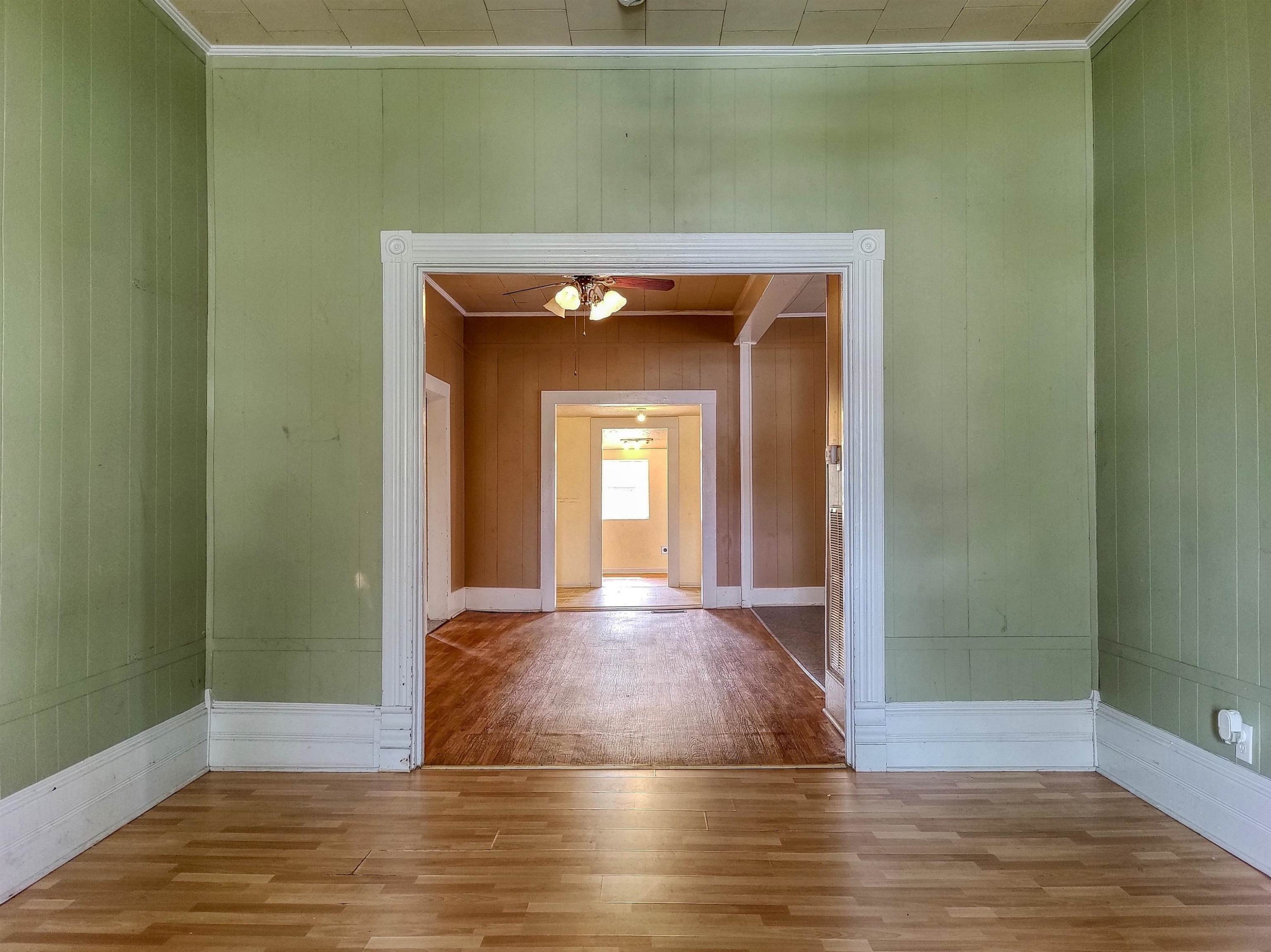 115 Walnut Lane McKenzie, TN 38201 - Photo 4 of 16 a view of a hallway with wooden floor