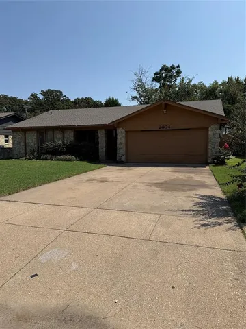 a front view of house with yard