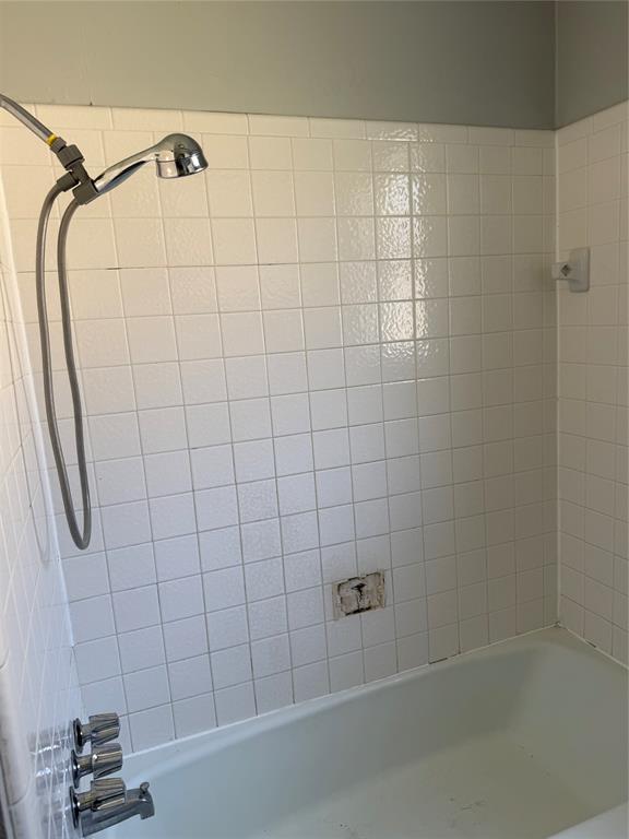 2604 Quail Valley Irving, TX 75060 - Photo 16 of 25 a bathroom with a shower