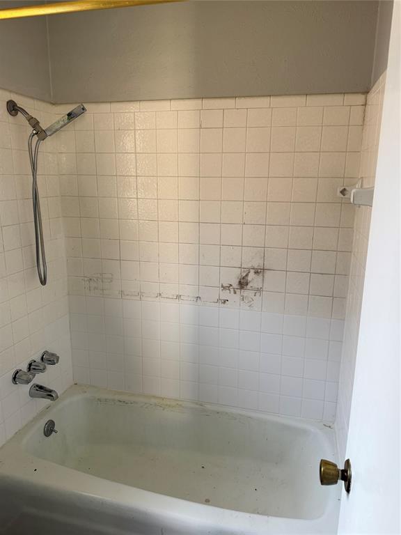 2604 Quail Valley Irving, TX 75060 - Photo 17 of 25 a close up of a bathtub in a bathroom