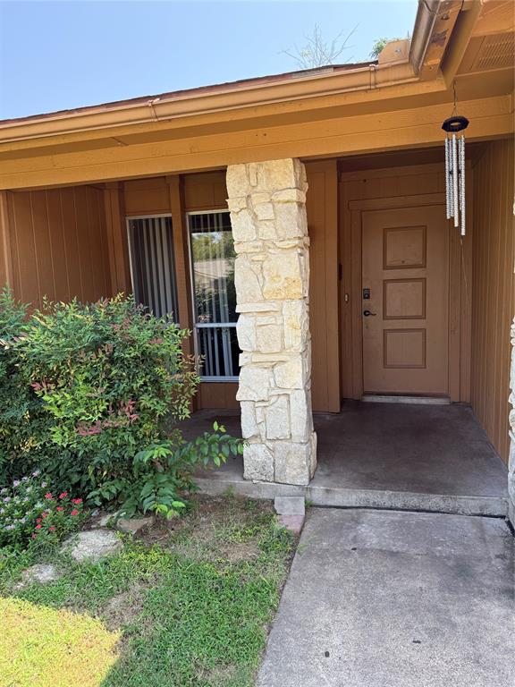 2604 Quail Valley Irving, TX 75060 - Photo 3 of 25 a front view of a house with a garage
