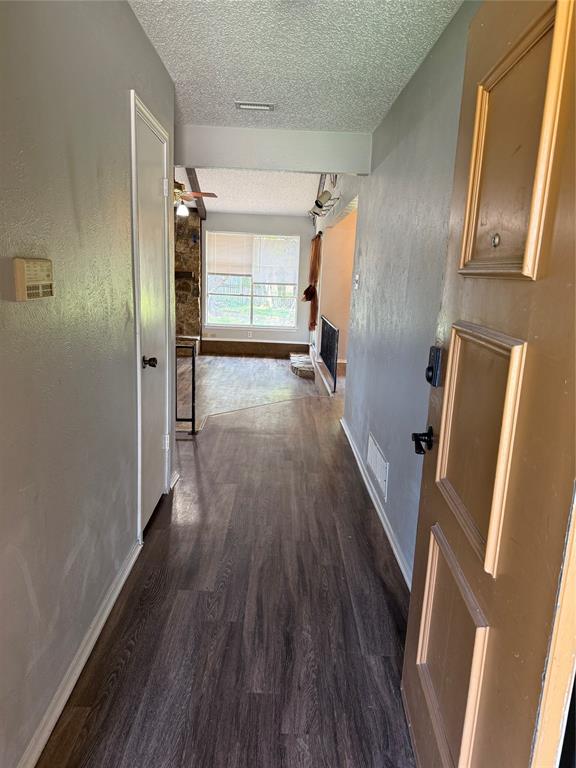 2604 Quail Valley Irving, TX 75060 - Photo 6 of 25 a view of entryway with wooden floor