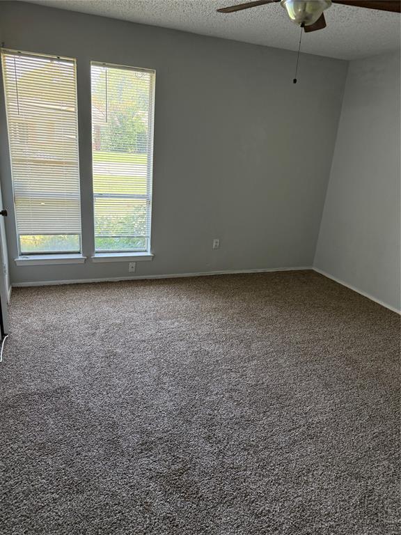 2604 Quail Valley Irving, TX 75060 - Photo 8 of 25 a view of a room that has a window in it