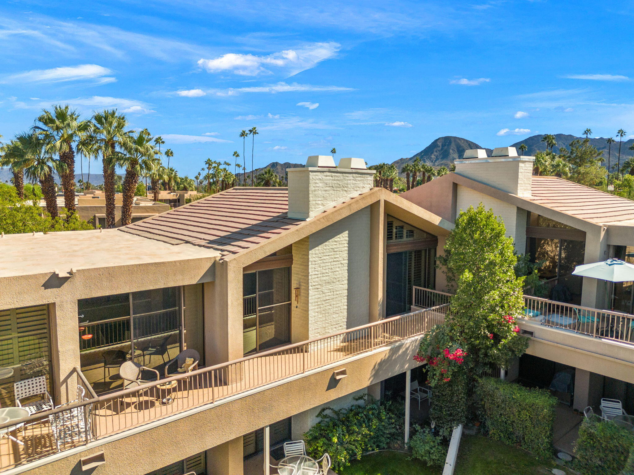 45775 Juniper Circle, Unit 616A Palm Desert, CA 92260 - Photo 12 of 35 a view of a house with a outdoor space