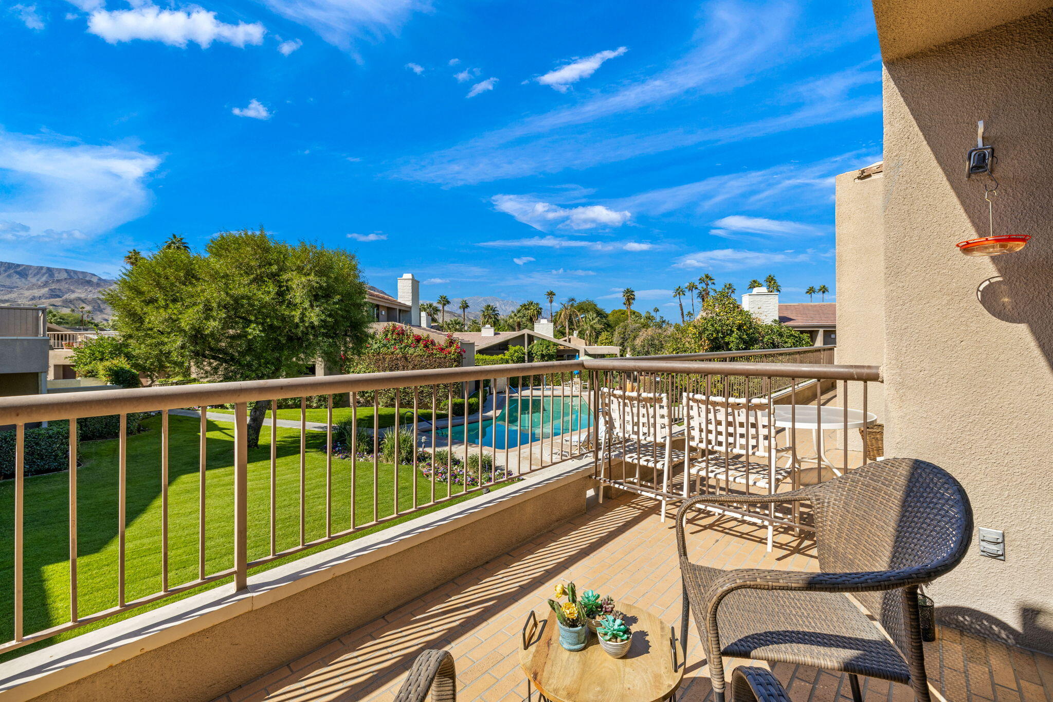 45775 Juniper Circle, Unit 616A Palm Desert, CA 92260 - Photo 14 of 35 a view of a balcony with chairs