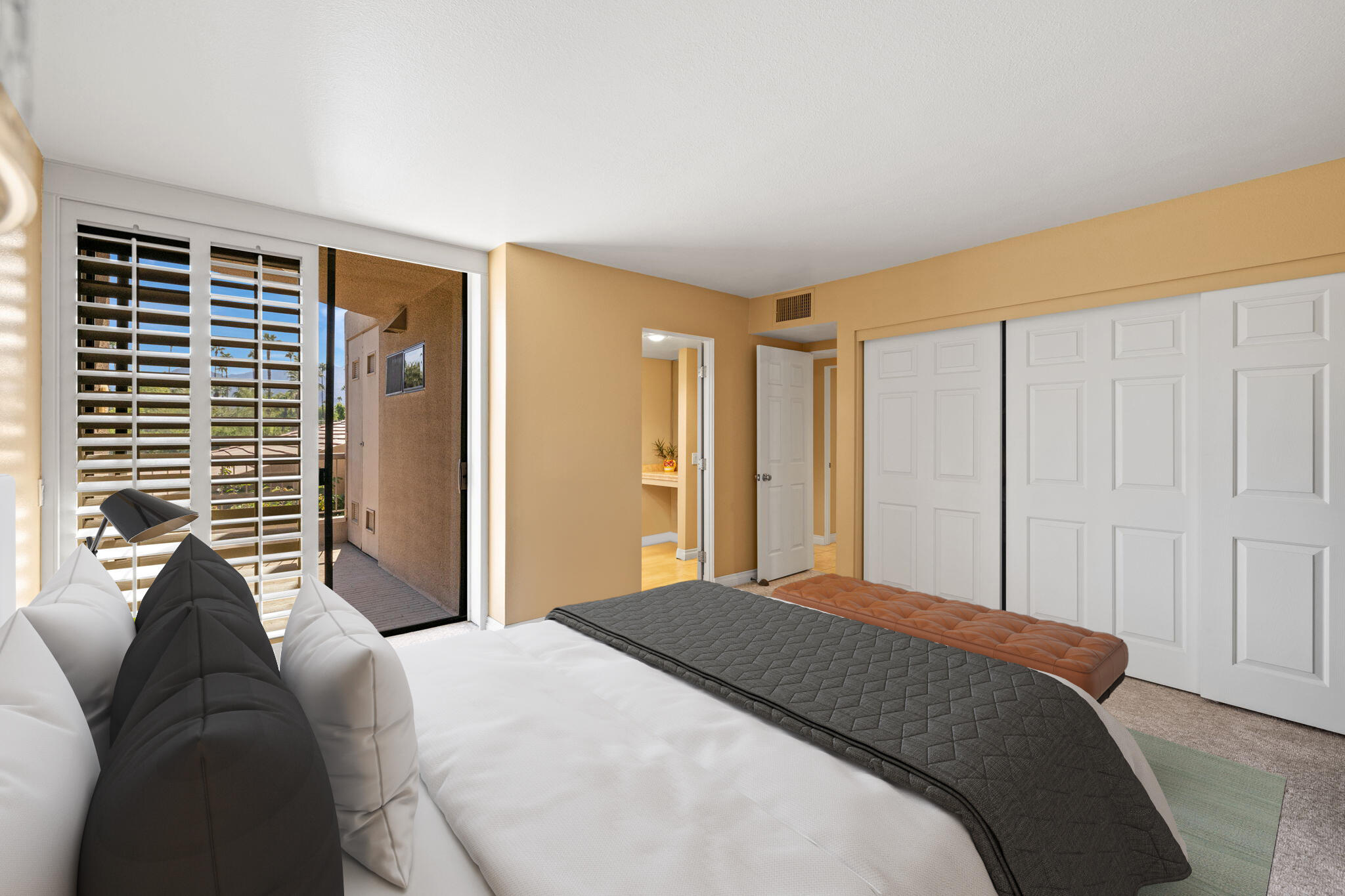 45775 Juniper Circle, Unit 616A Palm Desert, CA 92260 - Photo 24 of 35 a bedroom with a bed and a closet