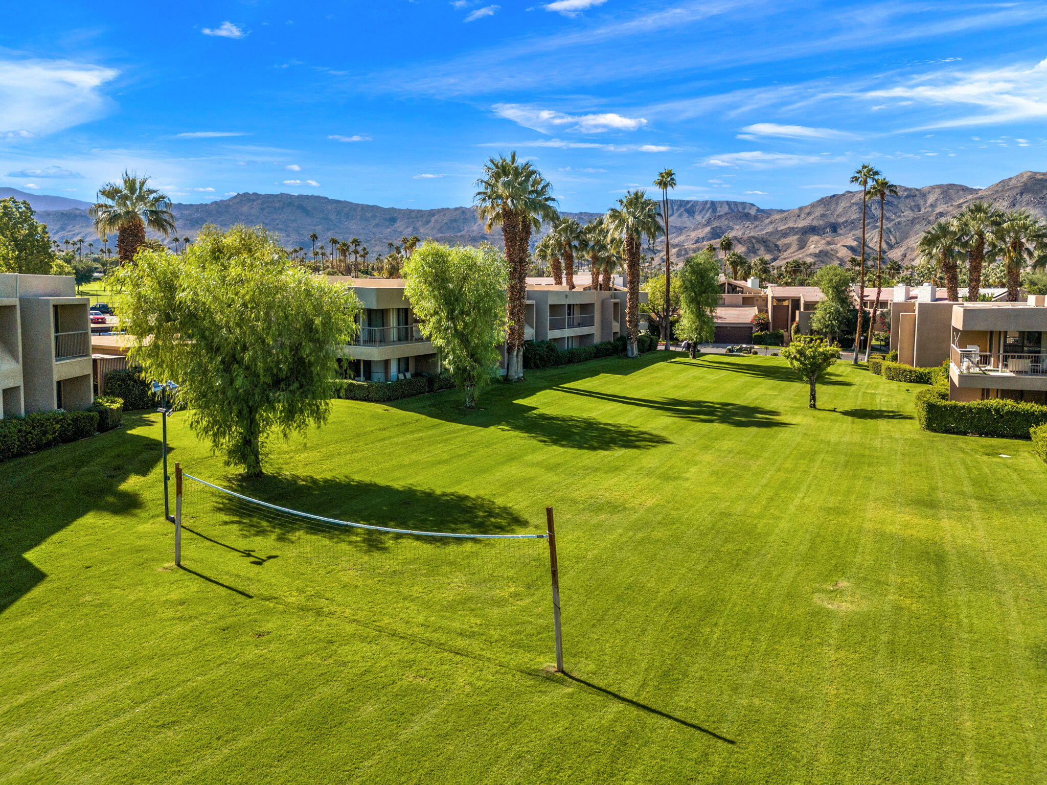 45775 Juniper Circle, Unit 616A Palm Desert, CA 92260 - Photo 35 of 35 a view of a house with a swimming pool