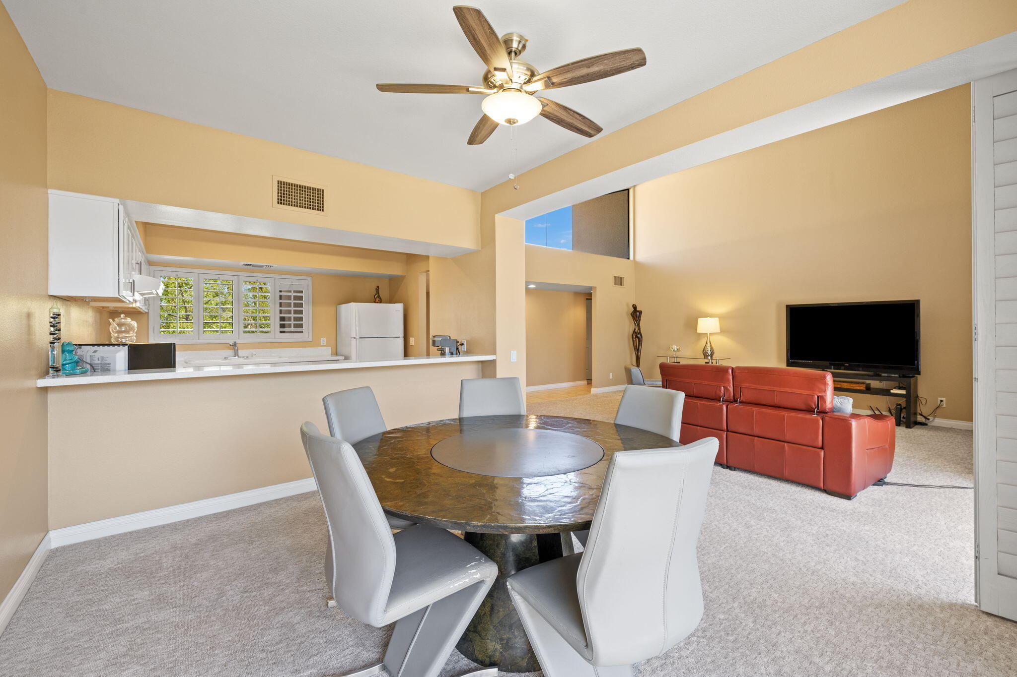 45775 Juniper Circle, Unit 616A Palm Desert, CA 92260 - Photo 4 of 35 a view of a dining room with furniture