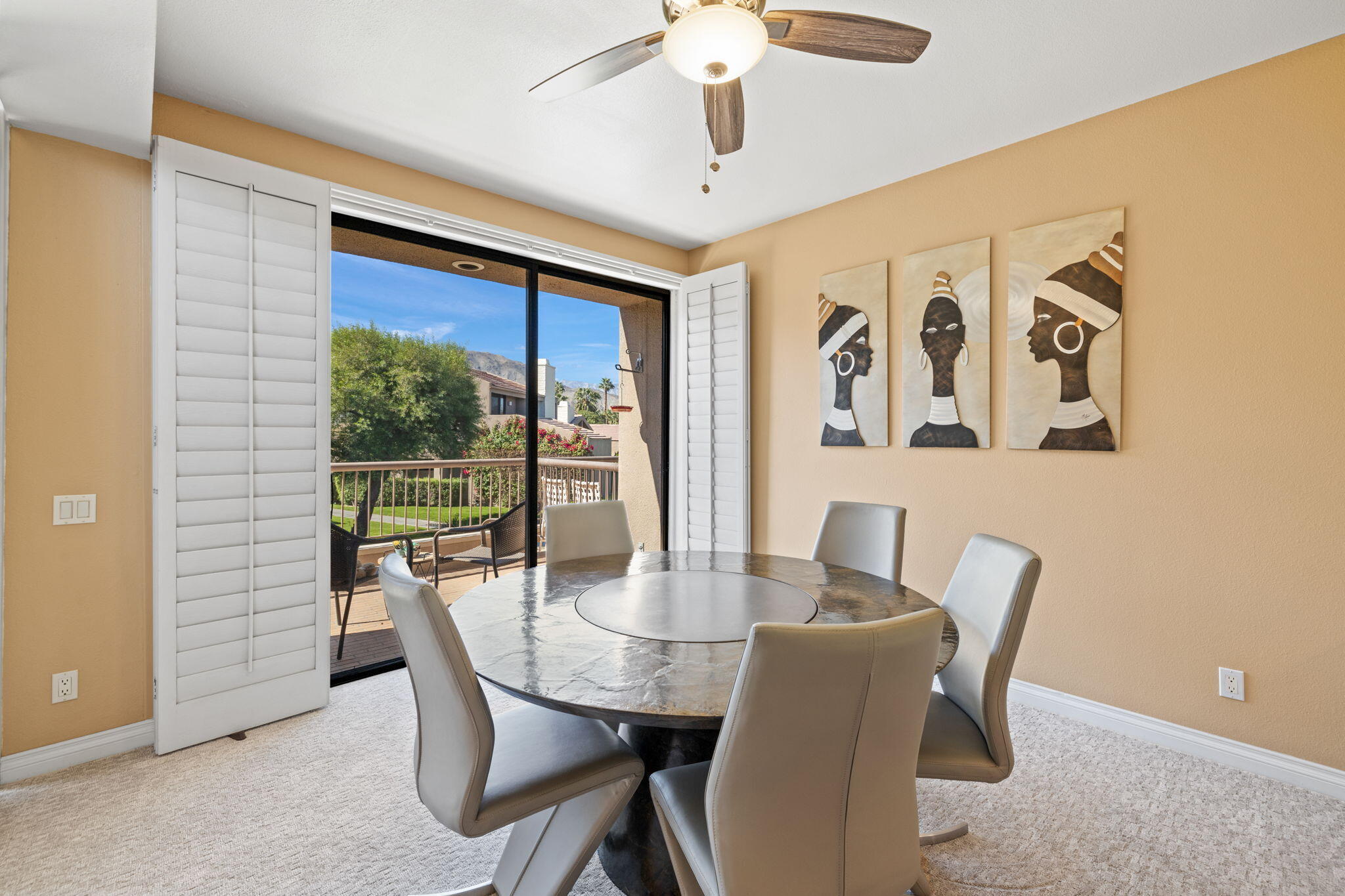 45775 Juniper Circle, Unit 616A Palm Desert, CA 92260 - Photo 6 of 35 a dining room with furniture and window