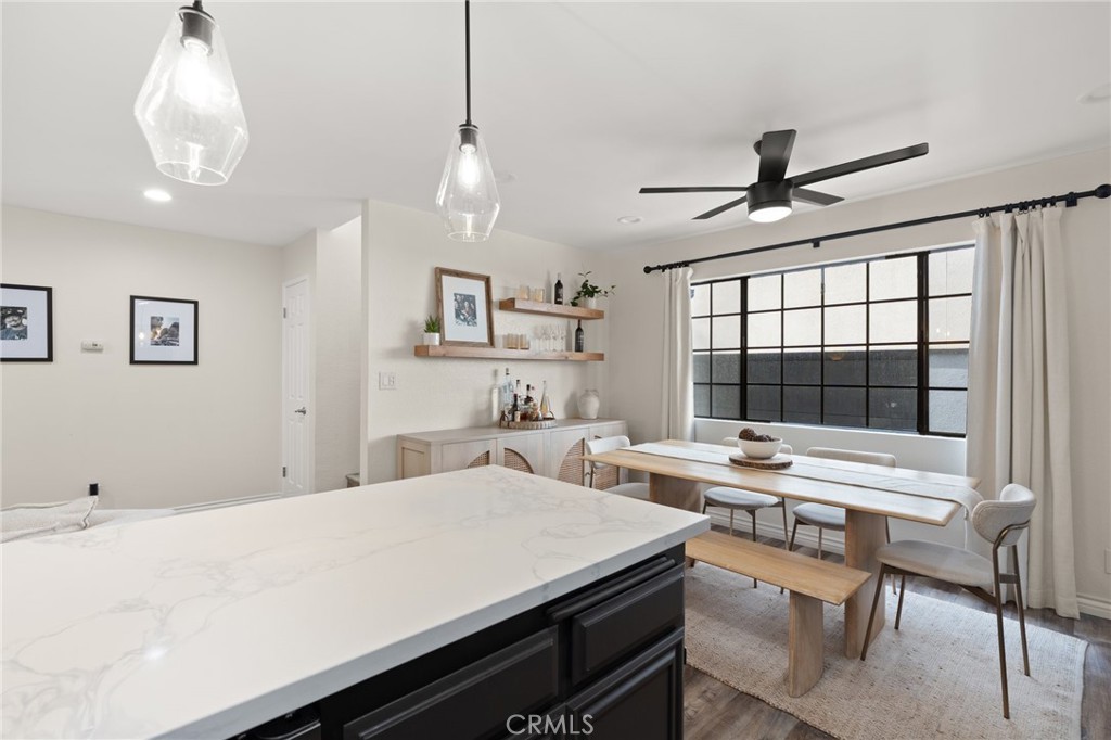 4345 154th Street, Unit 3 Lawndale, CA 90260 - Photo 11 of 31 a room with furniture a ceiling fan and a chandelier