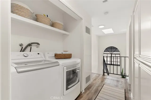a kitchen with a washer and dryer