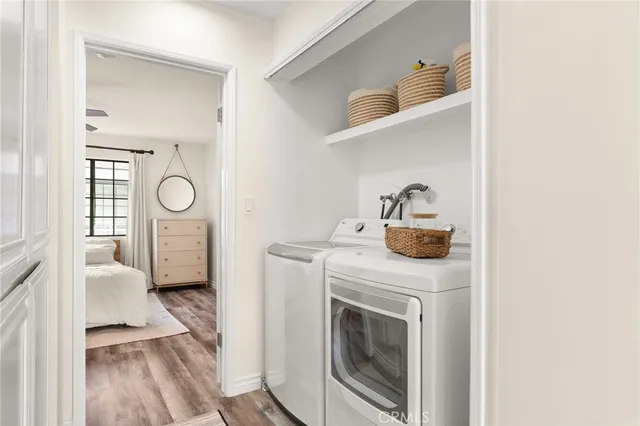 a bedroom with a bed closet and window