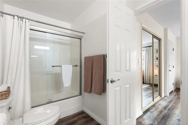 a bathroom with a double vanity sink and mirror
