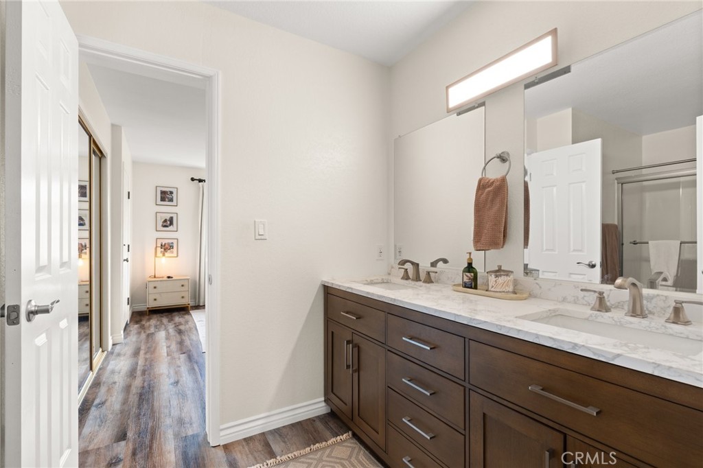 4345 154th Street, Unit 3 Lawndale, CA 90260 - Photo 26 of 31 a bathroom with a double vanity sink and mirror