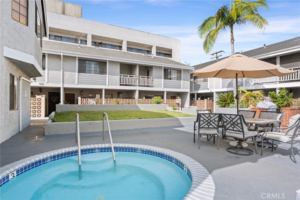 4345 154th Street, Unit 3 Lawndale, CA 90260 - Photo 29 of 31 a view of a house with a swimming pool and sitting area
