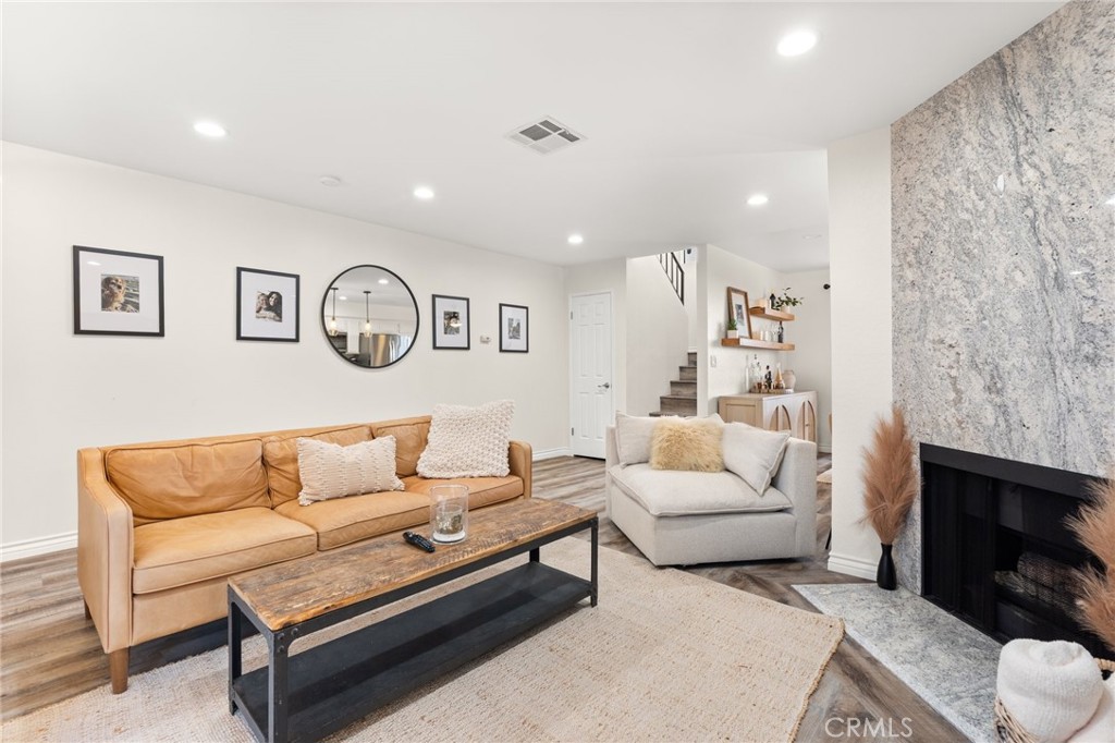 4345 154th Street, Unit 3 Lawndale, CA 90260 - Photo 3 of 31 a living room with furniture and a fireplace
