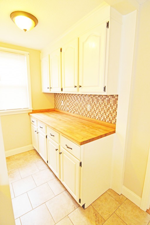 48-50 Jenness Street Springfield, MA 01104 - Photo 6 of 18 a view of a kitchen with a sink