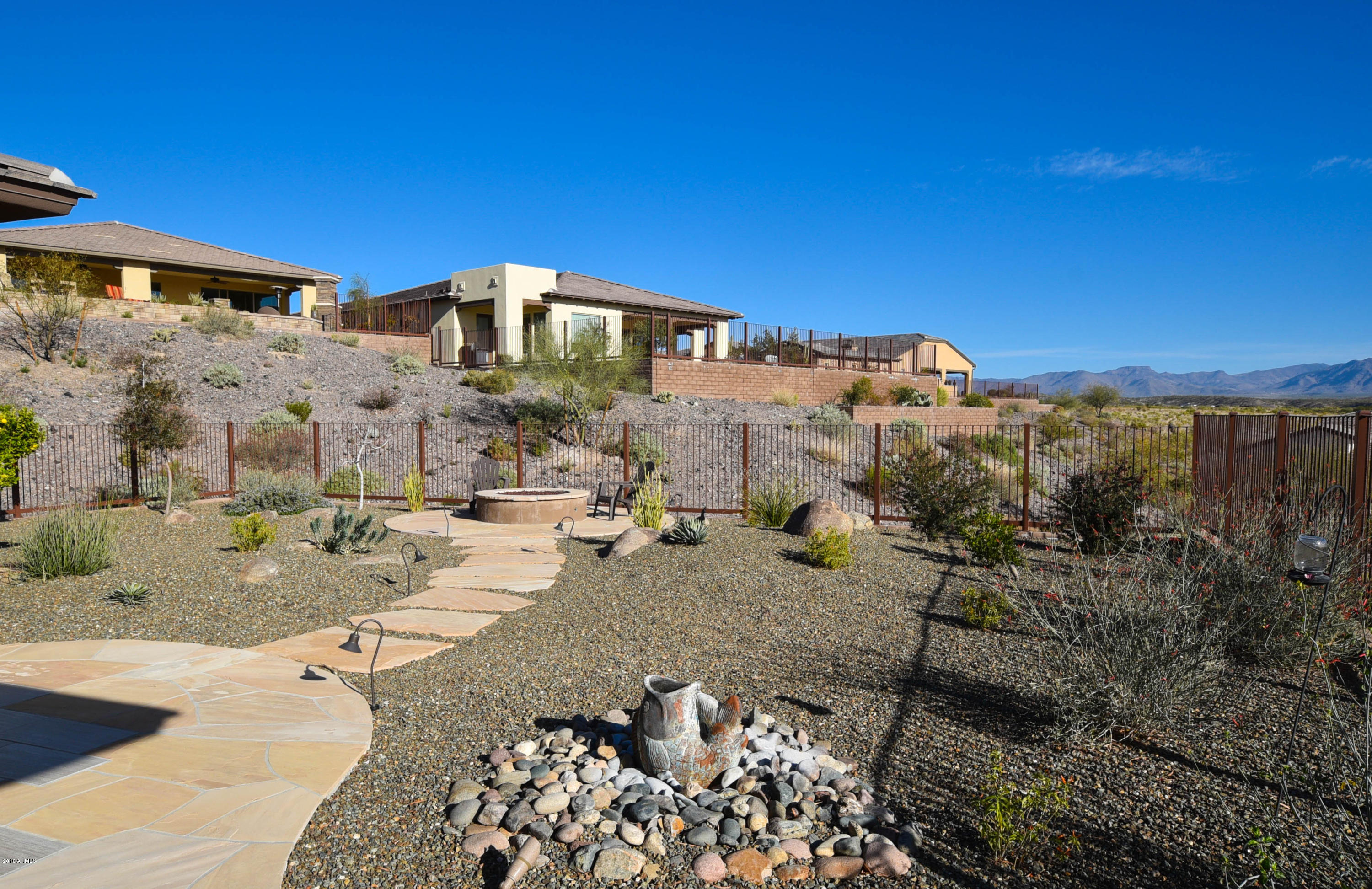 3266 Rising Sun Ridge Wickenburg, AZ 85390 - Photo 30 of 39 Beautifully Landscaped Backyard