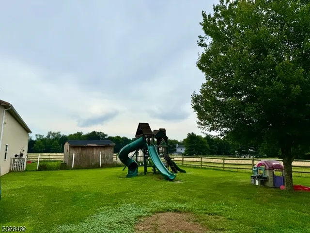a view of a garden with a slide