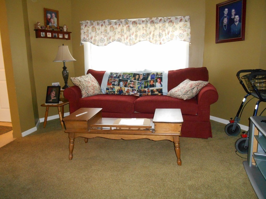 190 Dominion Road Worcester, MA 01605 - Photo 5 of 13 a couch sitting in a room next to a window