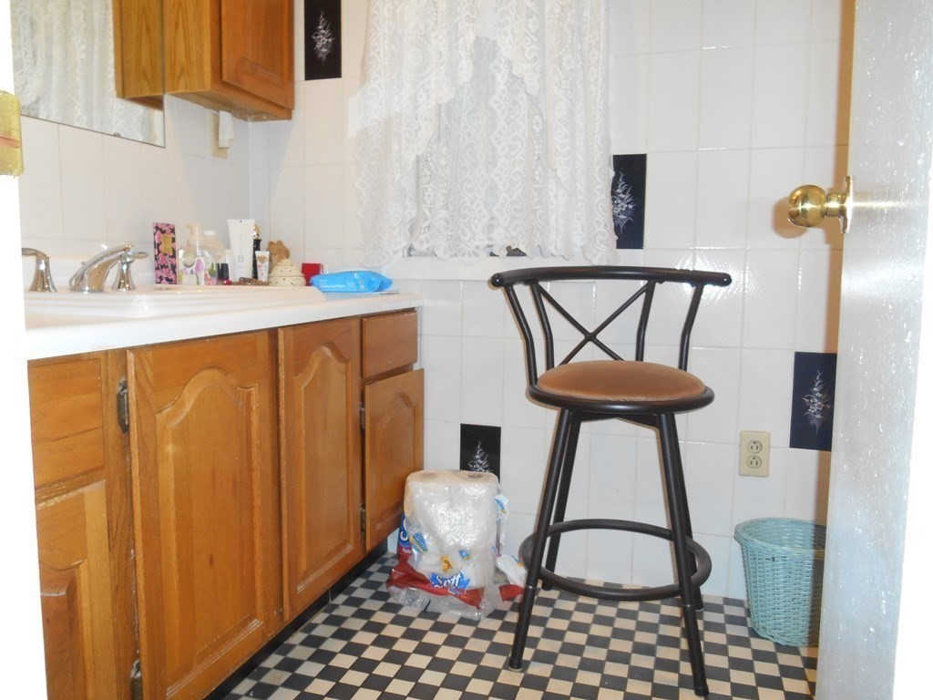 190 Dominion Road Worcester, MA 01605 - Photo 10 of 13 a bathroom with a sink and a mirror