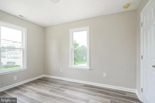 an empty room with window