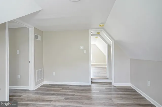 a view of a livingroom with wooden floor