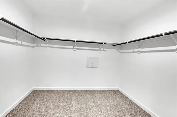 a view of room with window and outdoor space
