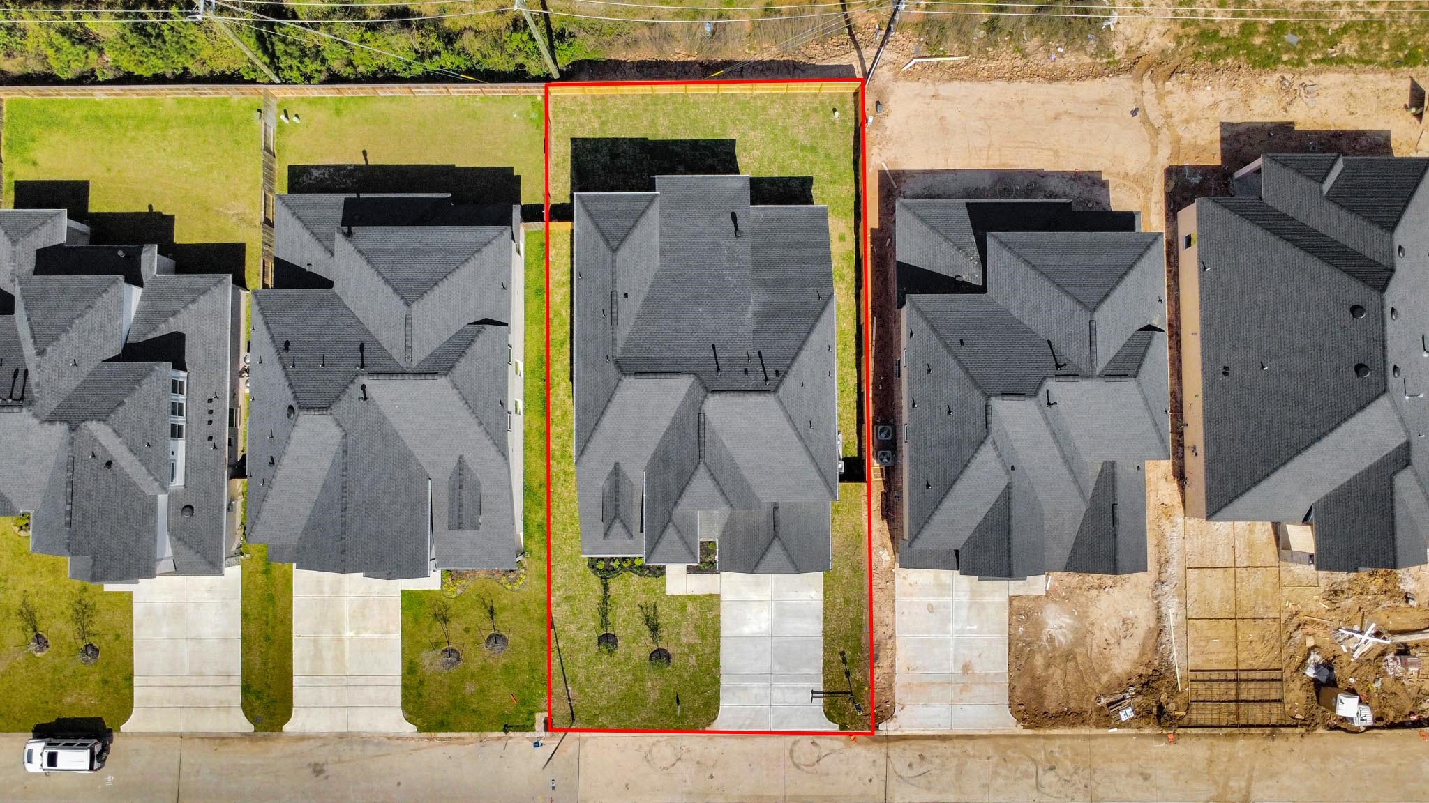 3023 Native Spg Drive Spring, TX 77373 - Photo 5 of 50 An aerial view of a spacious subdivision lot, highlighting a well-maintained yard and a fully fenced perimeter, offering both privacy and expansive outdoor space.