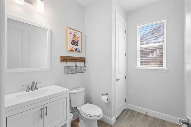 a en suite bathroom with a sink and a mirror