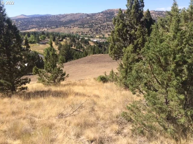 a view of a lake in front of a building