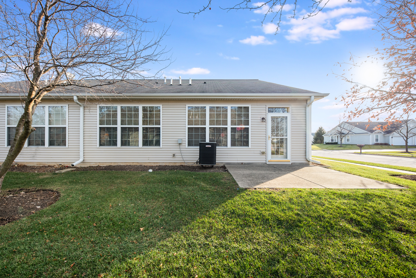 13512 Delaney Road Huntley, IL 60142 - Photo 18 of 24 a view of a house with backyard and porch