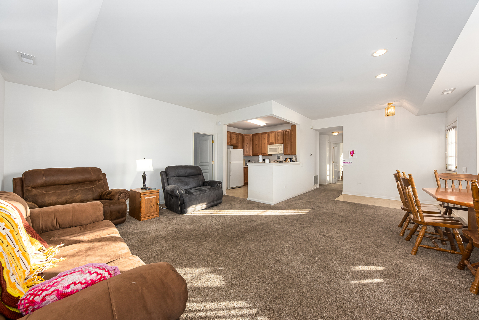 13512 Delaney Road Huntley, IL 60142 - Photo 4 of 24 a living room with furniture and a wooden floor