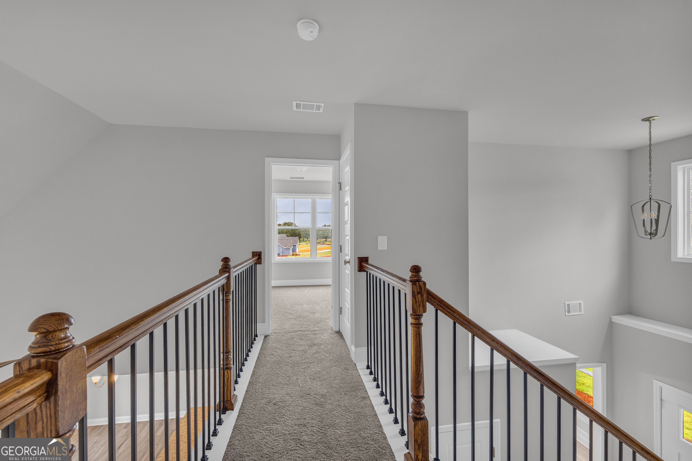 152 Sewell Road Lavonia, GA 30553 - Photo 34 of 60 a view of a hallway with wooden floor