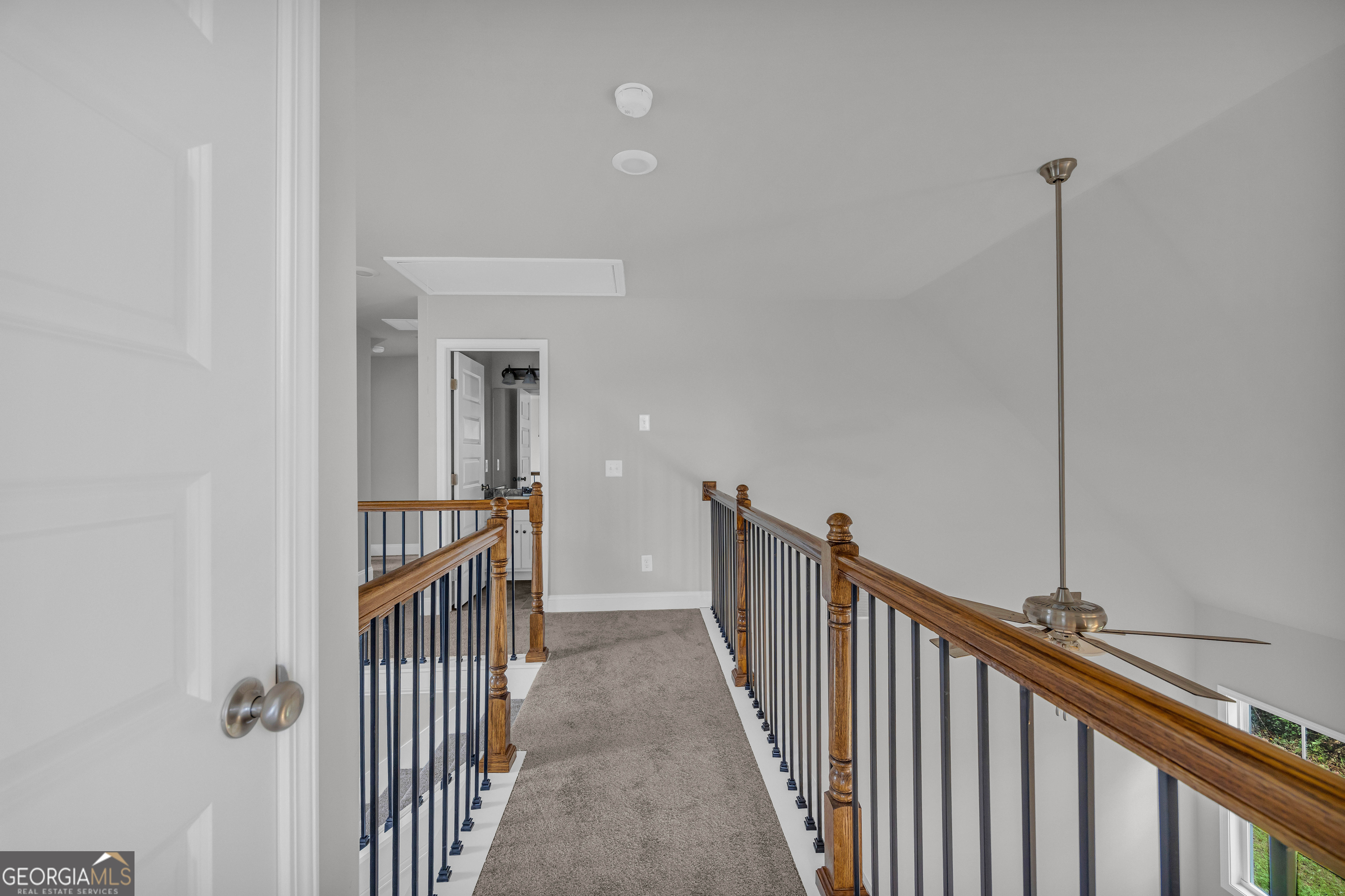 152 Sewell Road Lavonia, GA 30553 - Photo 38 of 60 a view of a hallway with wooden floor