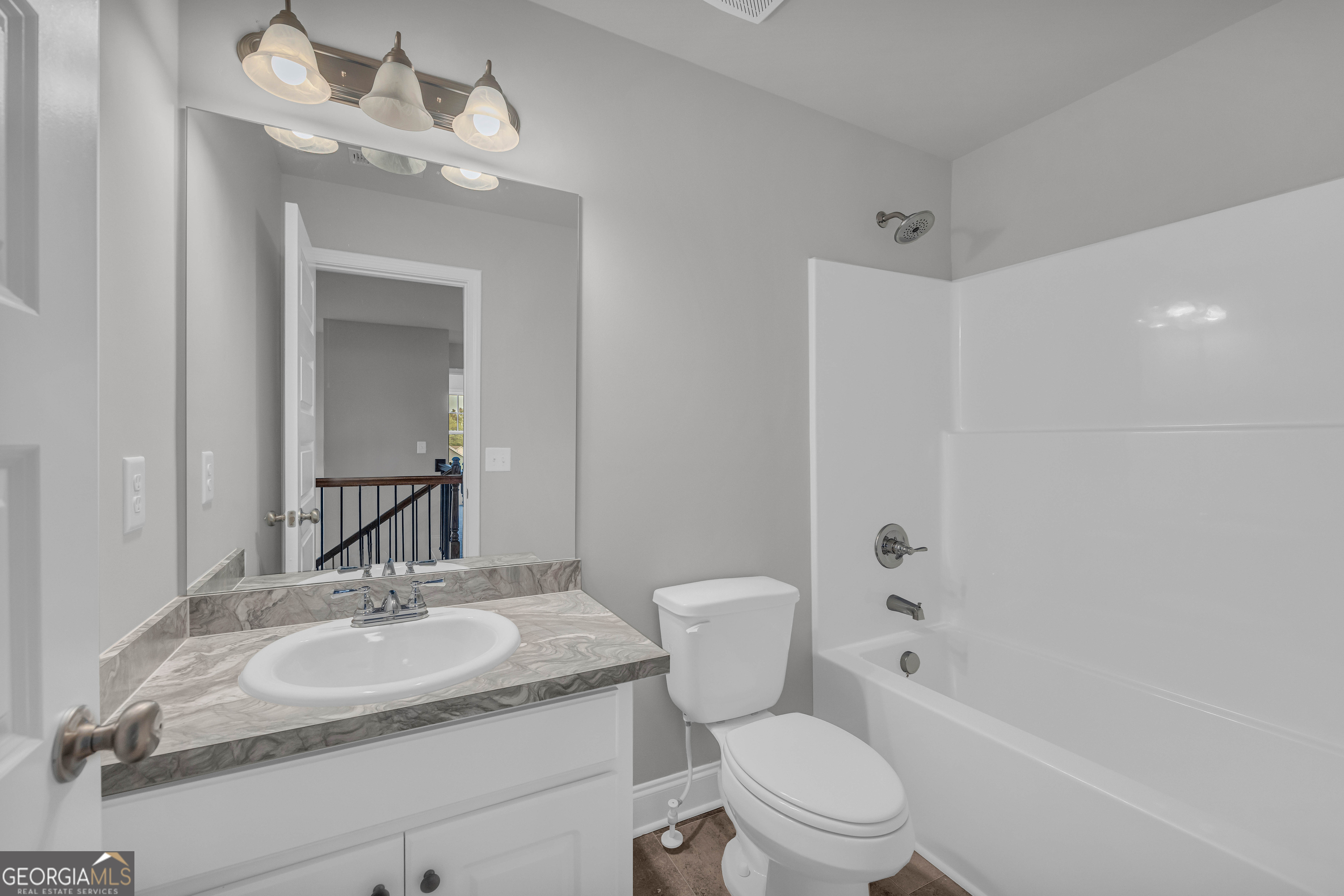 152 Sewell Road Lavonia, GA 30553 - Photo 39 of 60 a bathroom with a sink toilet vanity and shower