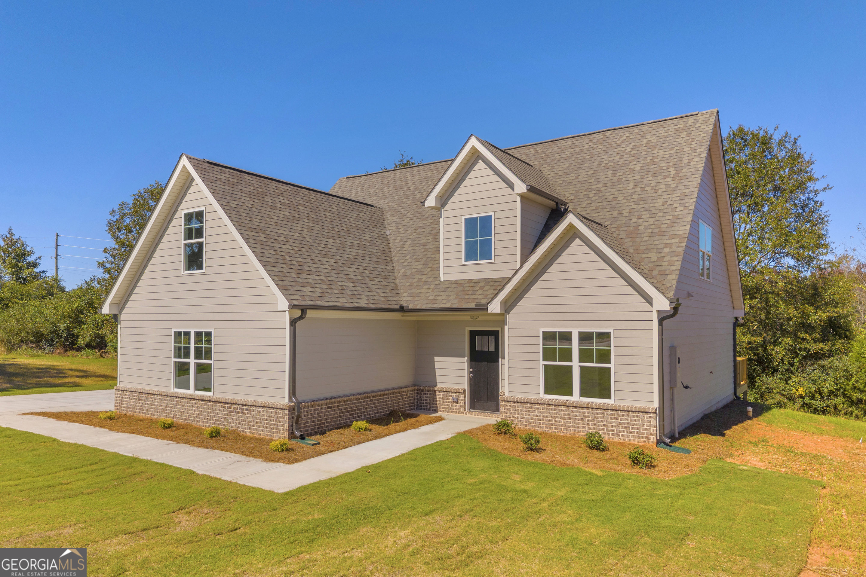 152 Sewell Road Lavonia, GA 30553 - Photo 52 of 60 a view of a house with a yard and sitting area