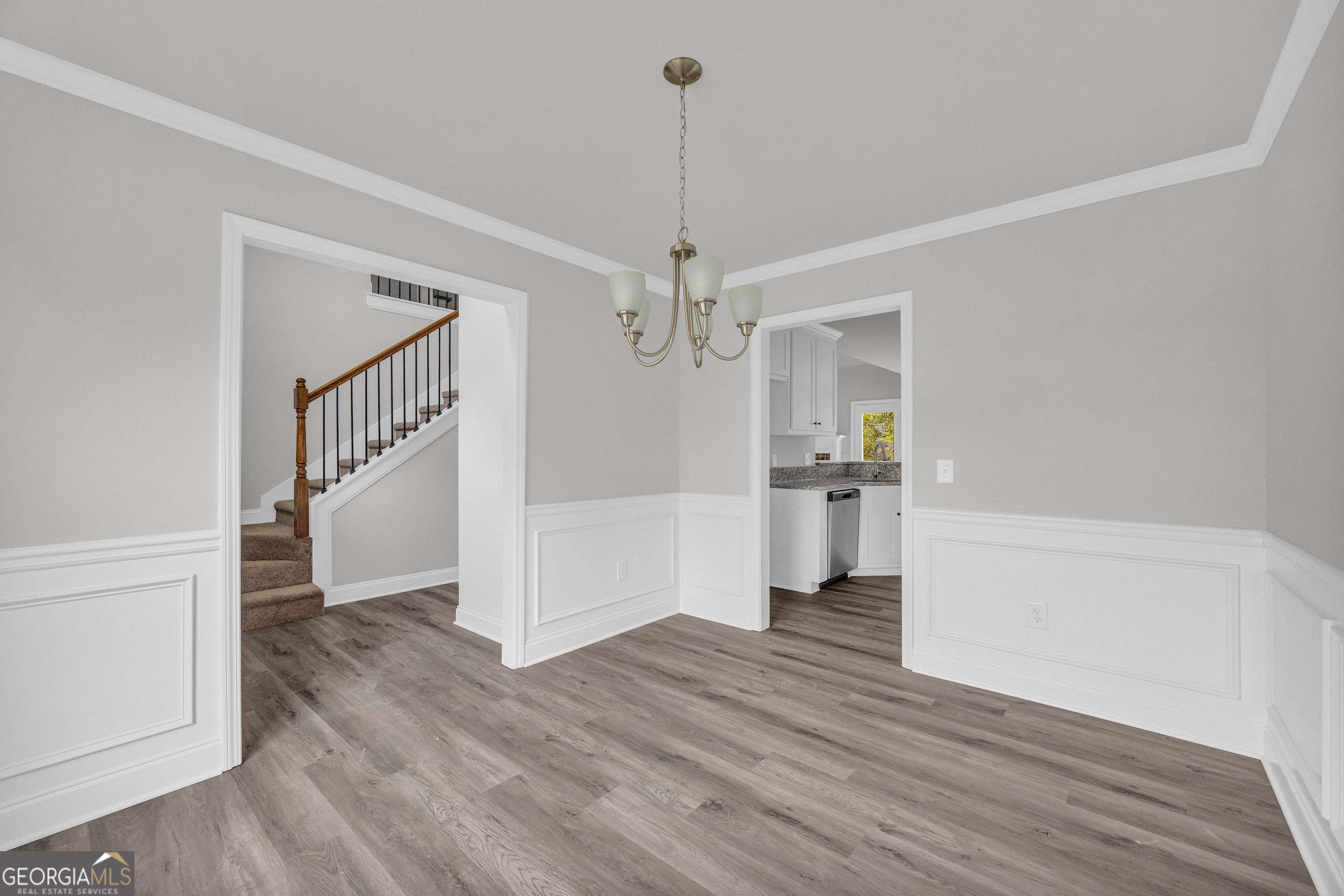 152 Sewell Road Lavonia, GA 30553 - Photo 7 of 60 a view of a hallway view with wooden floor and staircase