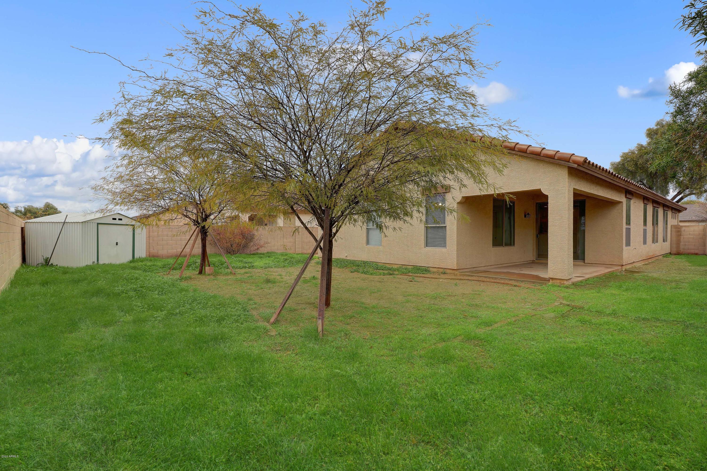 10229 West Cordes Road Tolleson, AZ 85353 - Photo 6 of 31 Spacious Backyard w Storage Shed