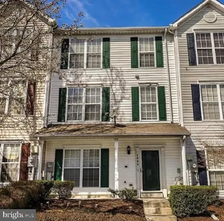 a front view of a house with windows
