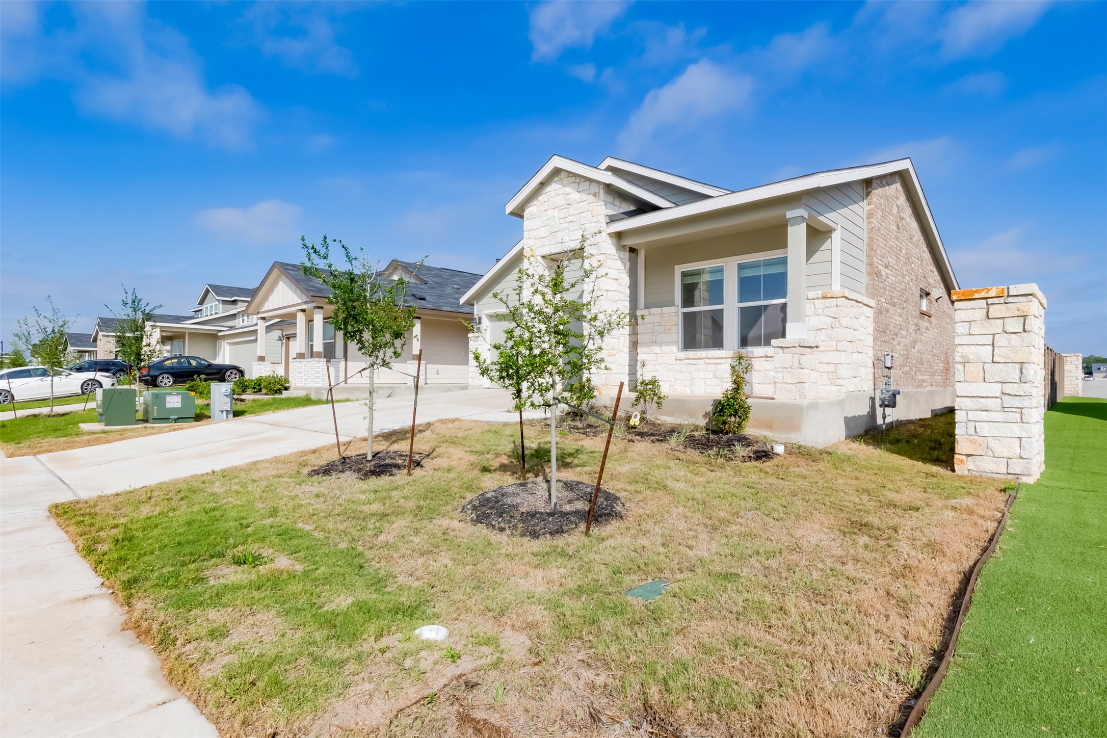 591 Avre Loop Kyle, TX 78640 - Photo 2 of 34 a backyard of a house with table and chairs