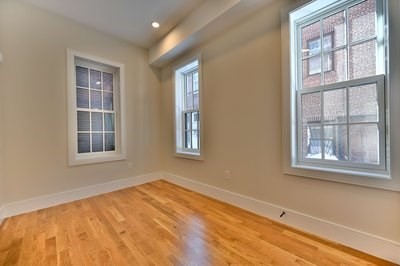 18 Winchester Street, Unit 2 Boston, MA 02116 - Photo 10 of 13 a view of an empty room with a window