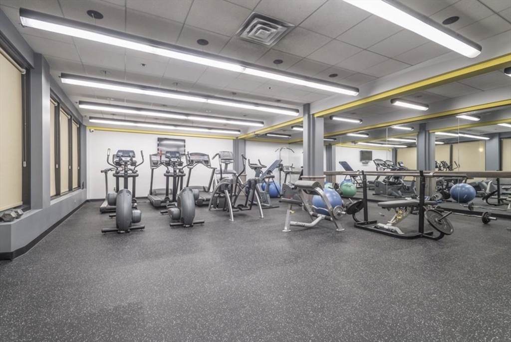 357 Commercial Street, Unit 507 Boston, MA 02109 - Photo 17 of 22 a view of a room with gym equipment