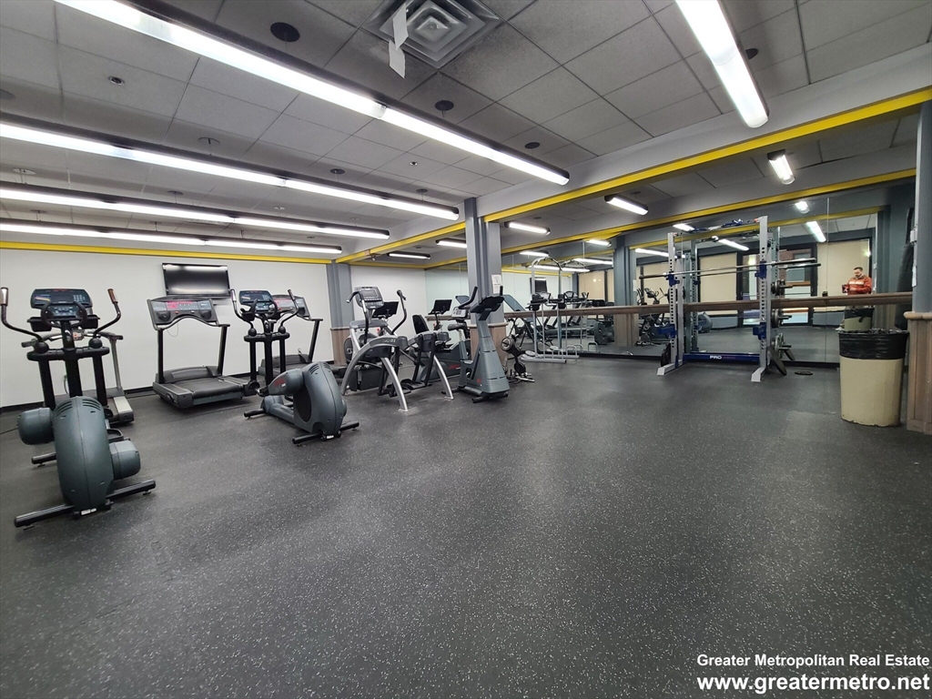 357 Commercial Street, Unit 507 Boston, MA 02109 - Photo 22 of 22 a view of a room with gym equipment