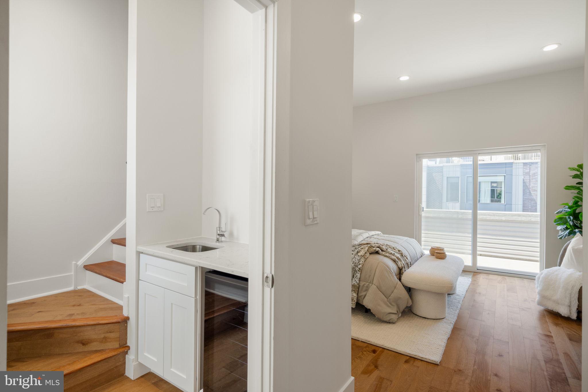 1125 South 24th Street Philadelphia, PA 19146 - Photo 41 of 55 Wet Bar and Stairs to Roof Deck