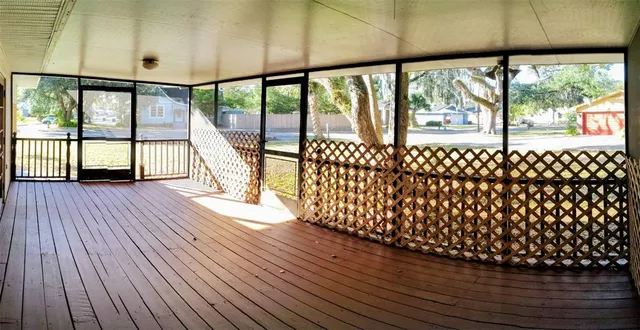 a view of porch with wooden floor and outdoor space