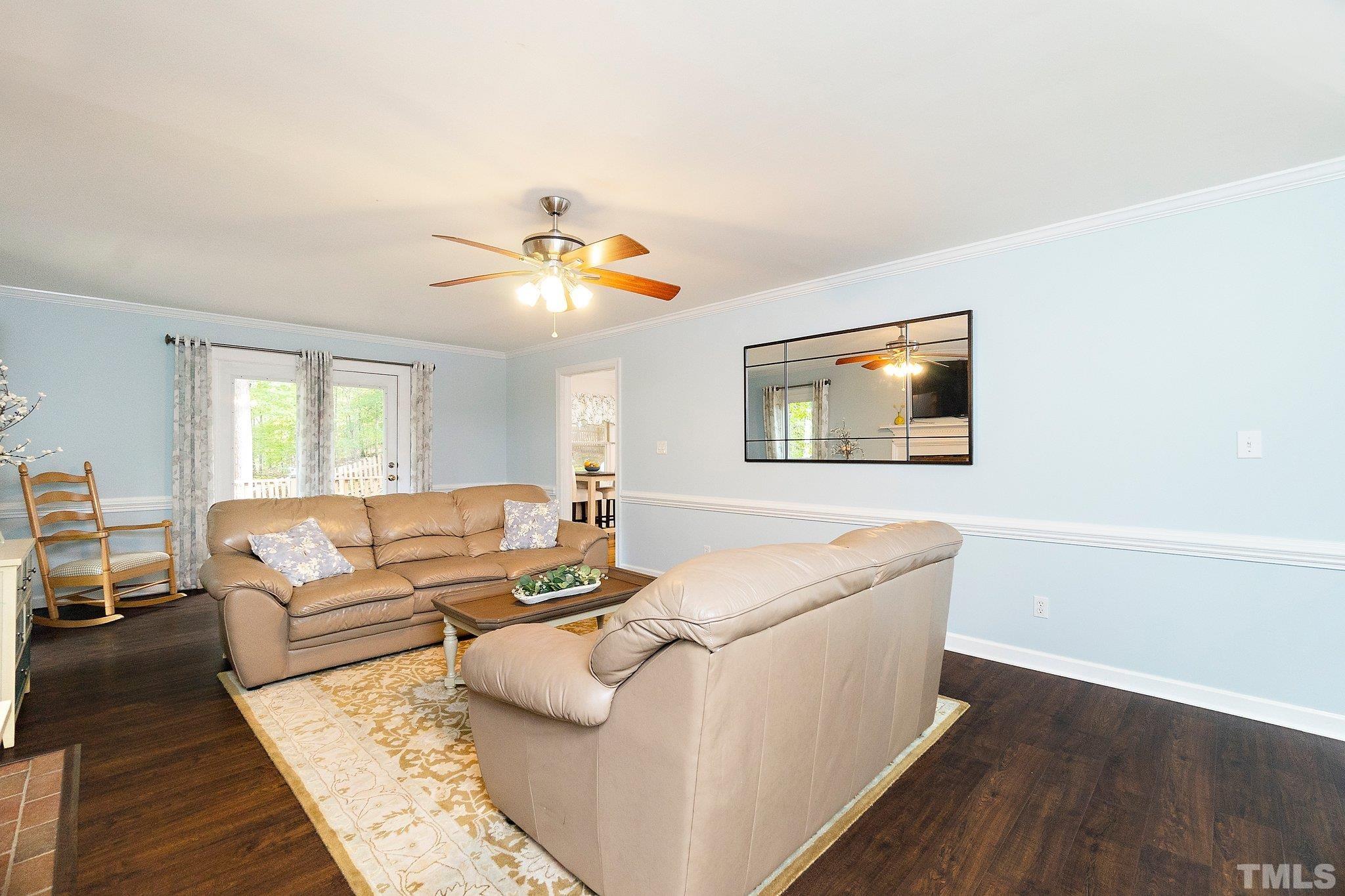 612 Morningside Drive Durham, NC 27713 - Photo 11 of 36 a living room with furniture and a flat screen tv