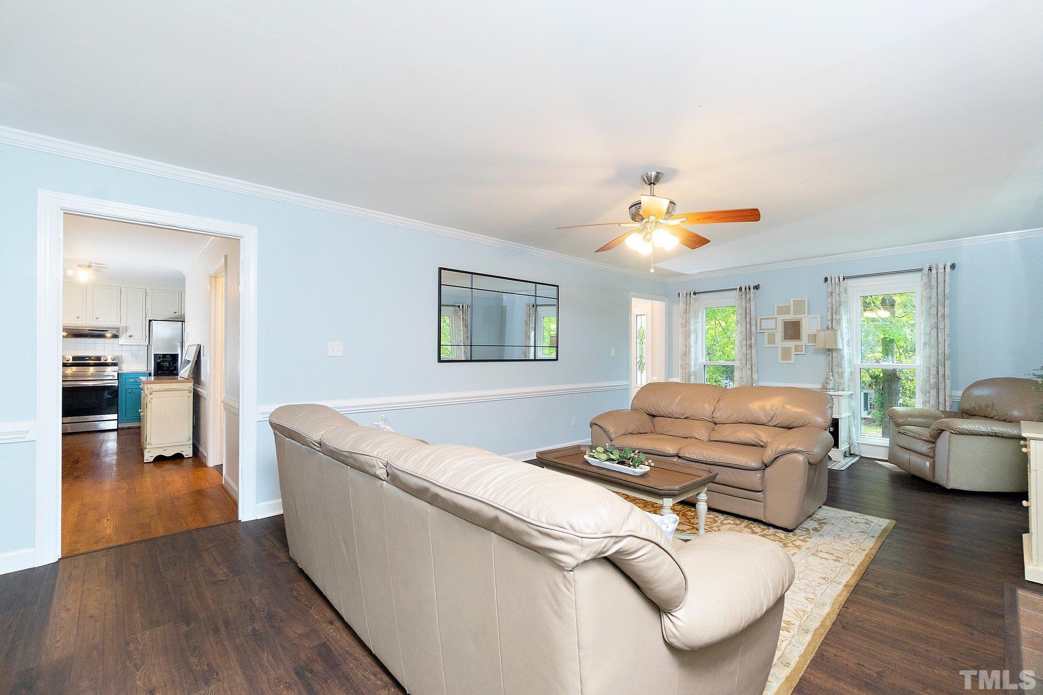 612 Morningside Drive Durham, NC 27713 - Photo 12 of 36 a living room with furniture and wooden floor