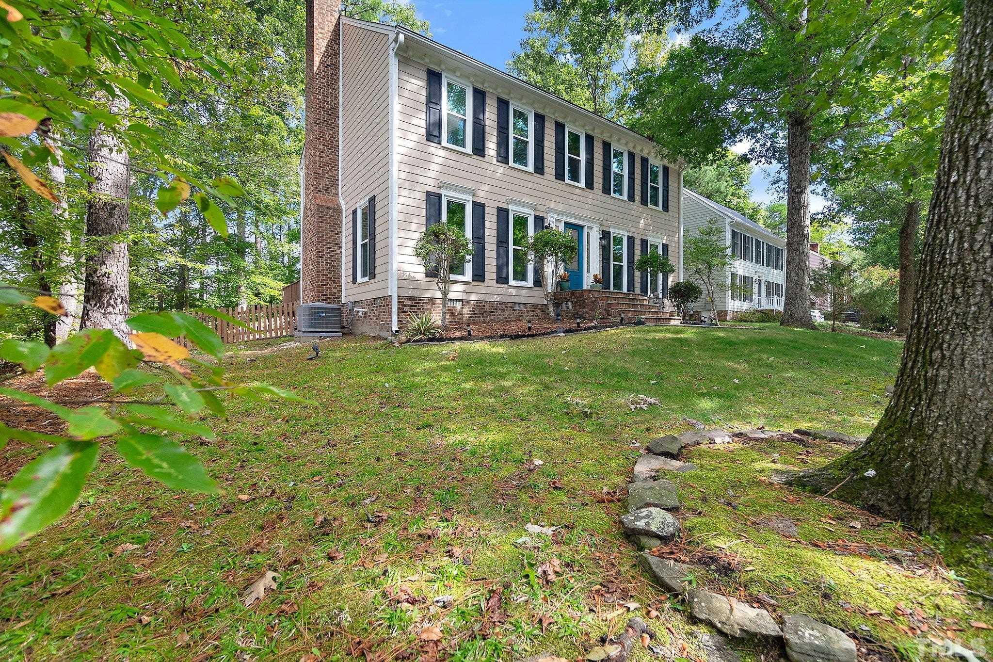 612 Morningside Drive Durham, NC 27713 - Photo 2 of 36 a view of a house with a yard